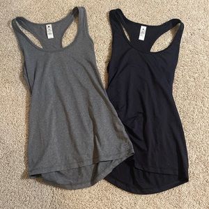 Two Yoga Licious tank tops in gray and black size womens xs